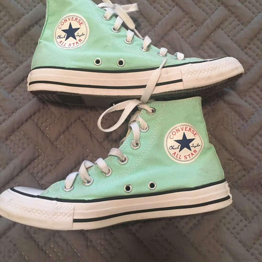 Women’s size 7 Chuck Taylor high top Converse.